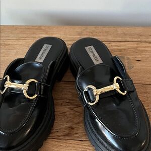 Steve Madden Glossy Black Loafers with Gold Buckle